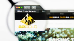 돋보기로 확대한 웹 브라우저의 b2gold(BTG) 로고